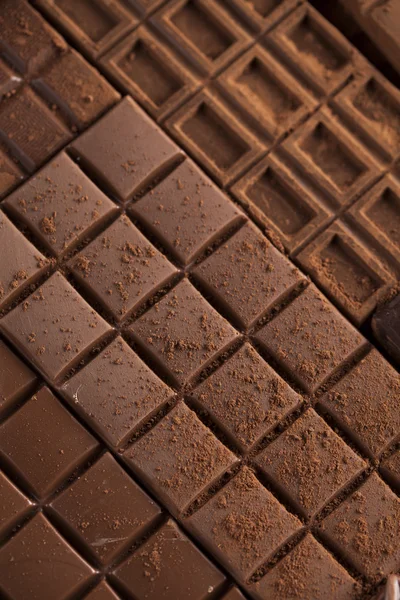 Chocolate bars with powder — Stock Photo, Image