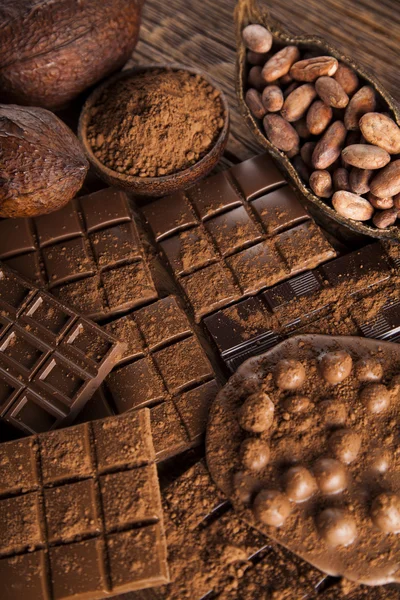 Chocolate bars with cacao beans — Stock Photo, Image