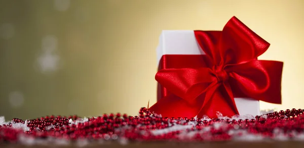 Christmas present with red ribbon — Stock Photo, Image