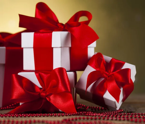 Presents with red ribbon — Stock Photo, Image