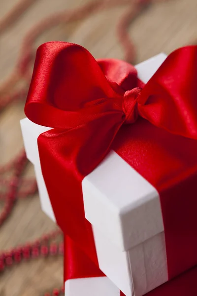 Gift box with red ribbon — Stock Photo, Image