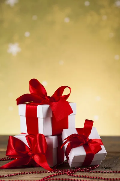 Gift boxes with red ribbon — Stock Photo, Image