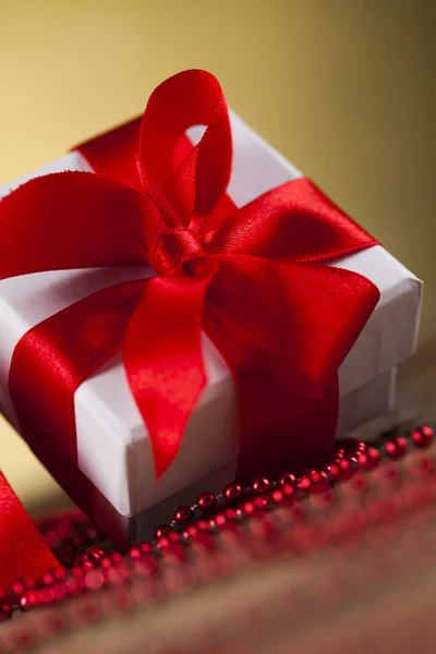 Gift box with red ribbon — Stock Photo, Image