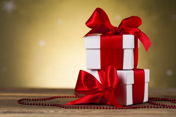 Presents with red ribbon — Stock Photo, Image