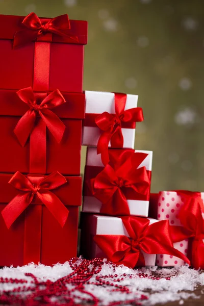 Gift boxes with red ribbon — Stock Photo, Image