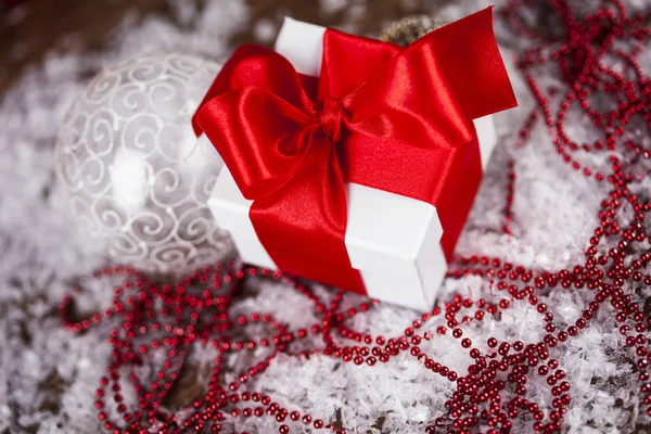 Background with decorations and gift box — Stock Photo, Image