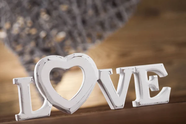 Wooden letters love and heart