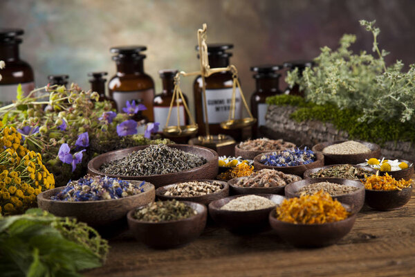 Herbal medicine on wooden desk background