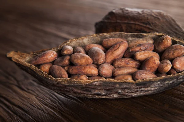 Cocoa pod on wooden table