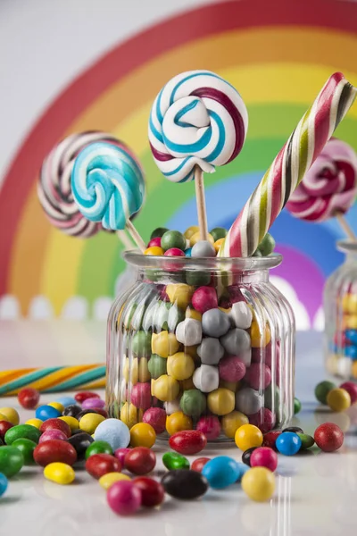 Colorful candies in jars — Stock Photo, Image