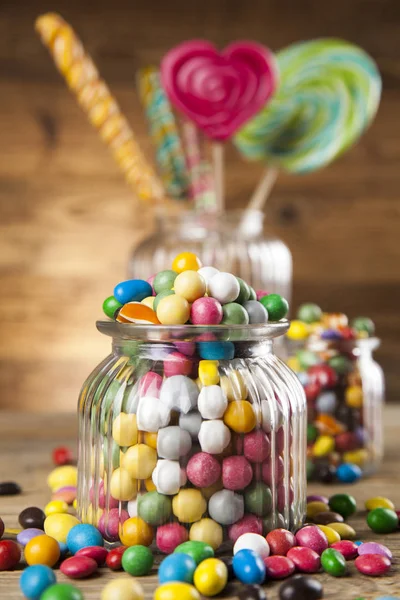 Colorful candies in jars — Stock Photo, Image