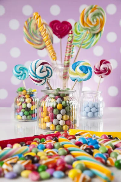 Colorful candies in jars — Stock Photo, Image