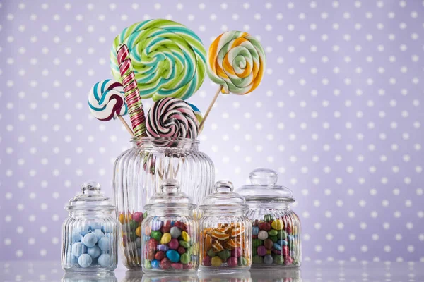 Colorful candies in jars