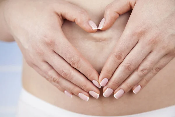Piękna kobieta w ciąży brzuch — Zdjęcie stockowe