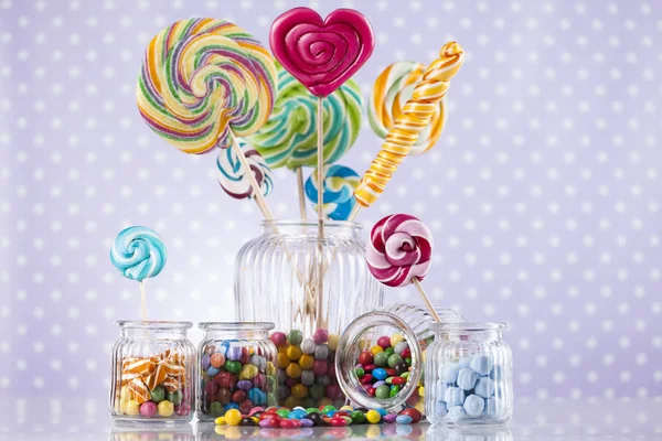 Colorful candies in jars