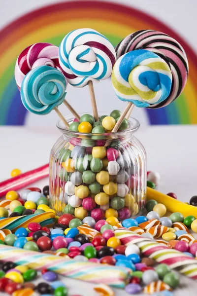 Glass jars in Colorful candies — Stock Photo, Image