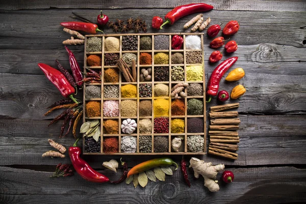 Assorted Spices in a wooden box — Stock Photo, Image