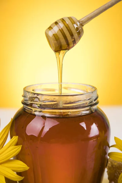 Fresh honey on wooden table — Stock Photo, Image