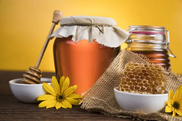 Jar of liquid honey — Stock Photo, Image