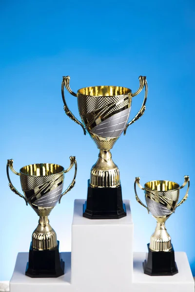 Winner podium sports symbols. Sport podium, Cups of winners award
