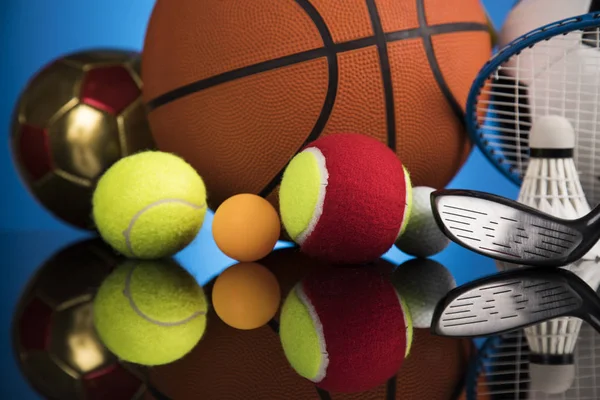 Sports balls with equipment