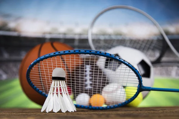 Sport equipment and balls, stadium background