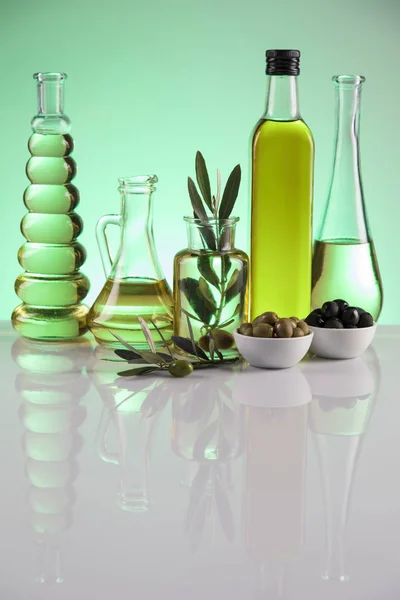 Cooking olive oils, bottles background