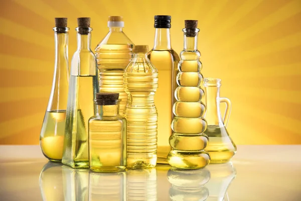 Cooking oils in bottle background — Stock Photo, Image