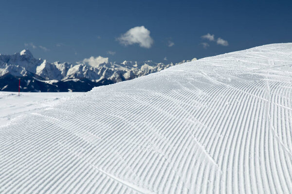 Fresh snow on ski slope, winter landscape
