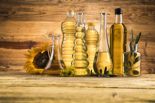 Healthy oil from sunflower, olive, rapeseed oil. Cooking oils in — Stock Photo, Image