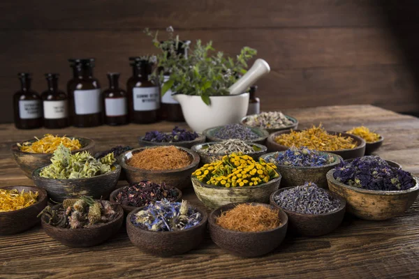 Natural remedy,Herbal medicine and wooden table background — Stock Photo, Image