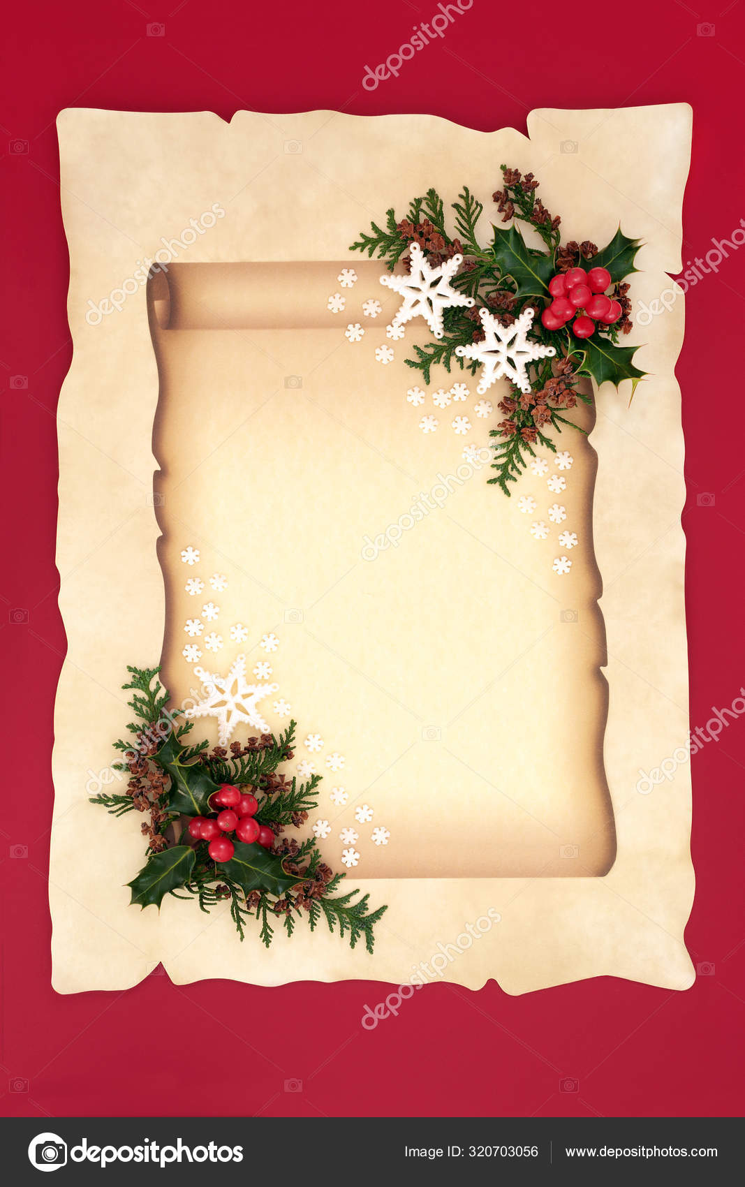 Christmas Scroll on Parchment Paper with Holly & Cedar Stock Photo