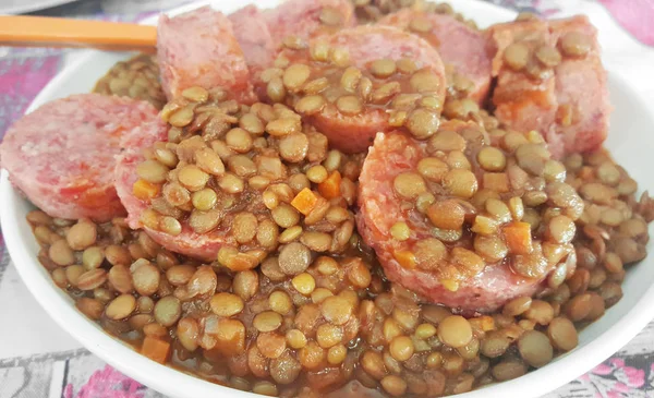 Sausages with boiled lentil — Stock Photo, Image