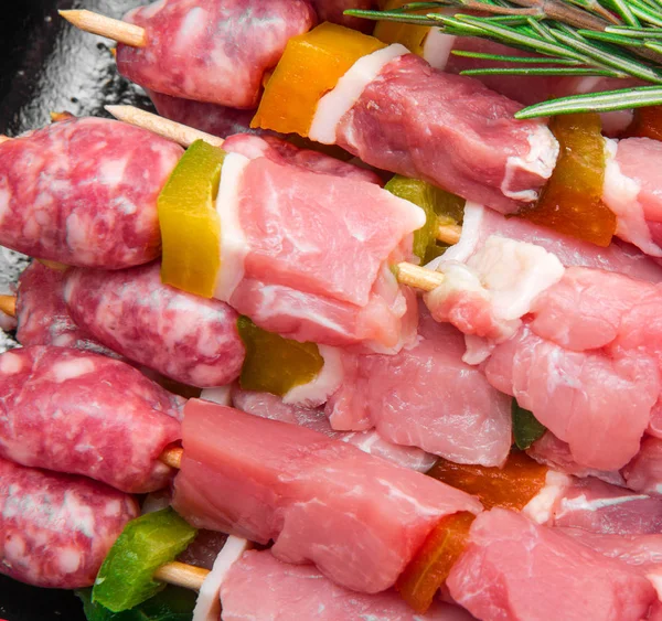 Meat skewers with rosemary — Stock Photo, Image