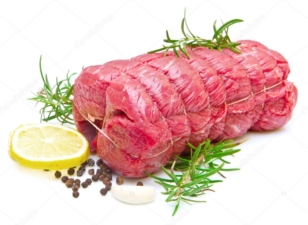 roast of beef with rosemary on white