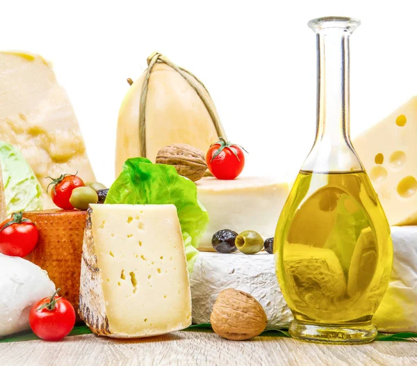 Various types of cheese on white wood — Stock Photo, Image