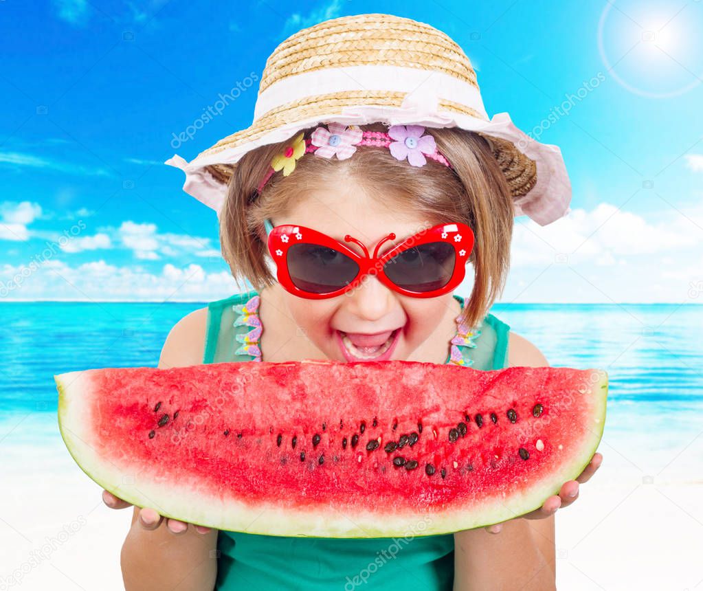  girl  eats juicy watermelon