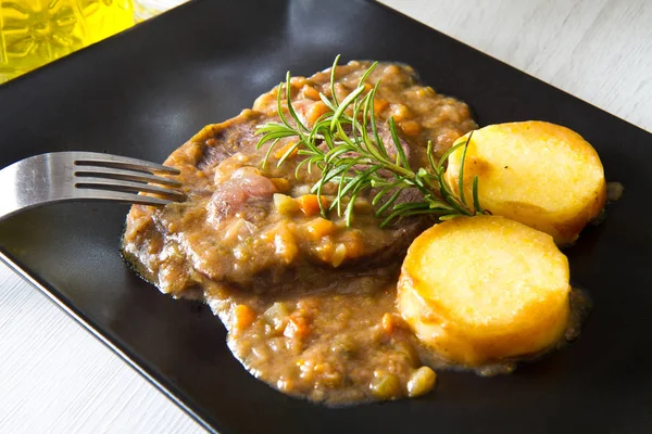 Braised meat with polenta — Stock Photo, Image