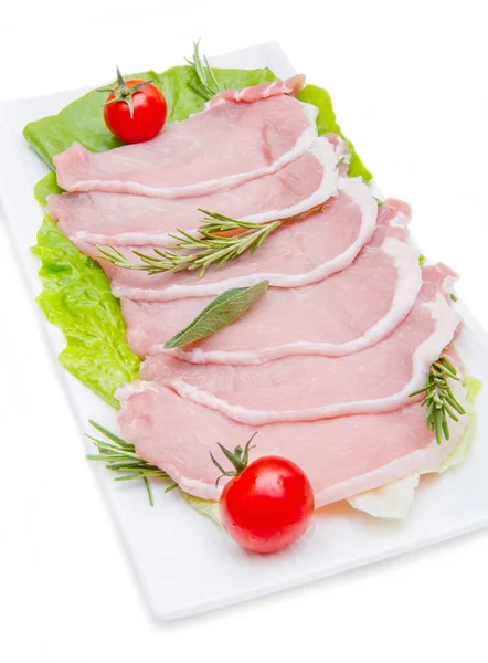 Tranches de longe de porc sur l'assiette — Photo