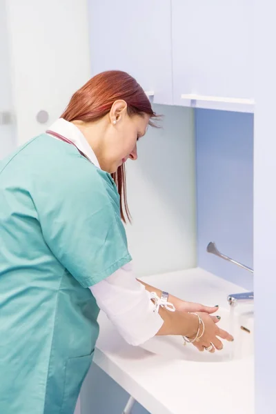 a doctor washing hands - Medical cleanup
