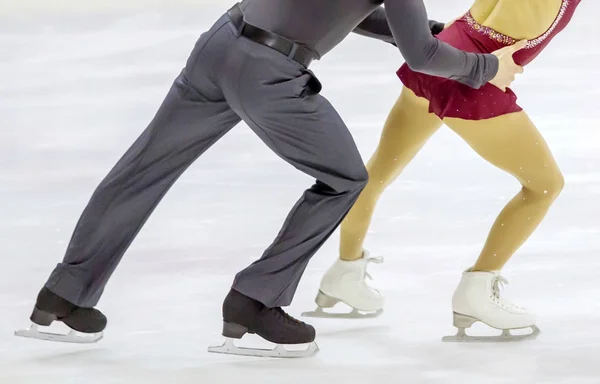 two skaters dance on ice