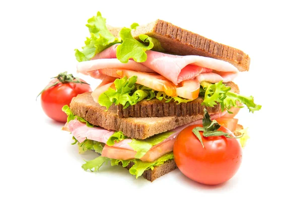 Sanduíches com presunto, salada e tomate — Fotografia de Stock