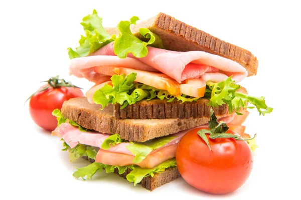 Sandwiches with ham, saladf and tomatoes — Stock Photo, Image