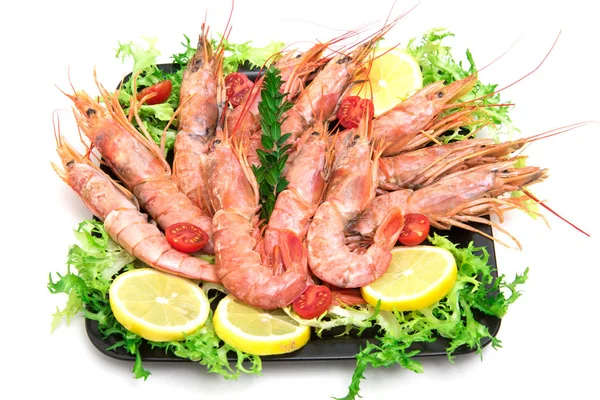 Raw fresh Prawns on black dish on white background — Stock Photo, Image