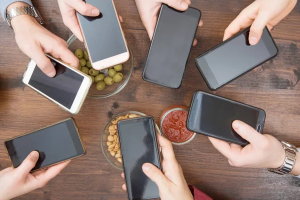 Top view hands circle using phone in cafe — Stock Photo, Image