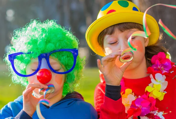 Funny carnival kids smiling and playing outdoor — Stock Photo, Image