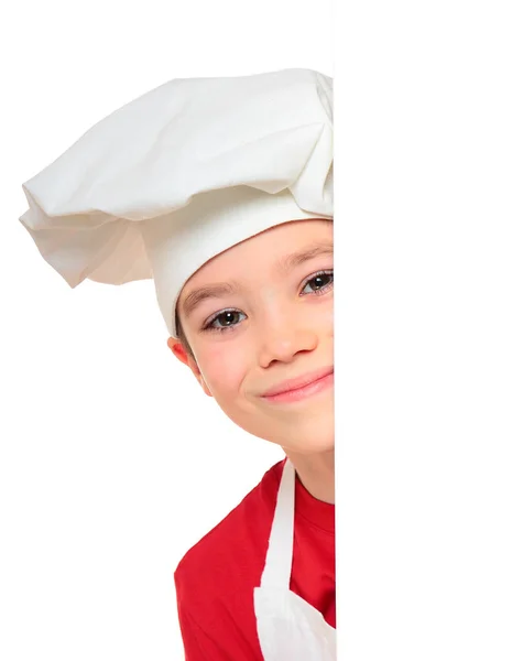 Мальчик-повар на белом — стоковое фото