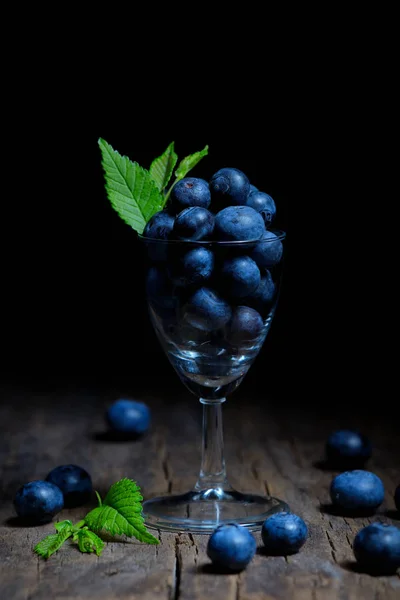 Blueberries in small glass — Stock Photo, Image