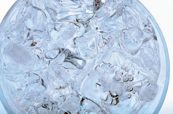 Glass with frozen ice cubes isolated — Stock Photo, Image