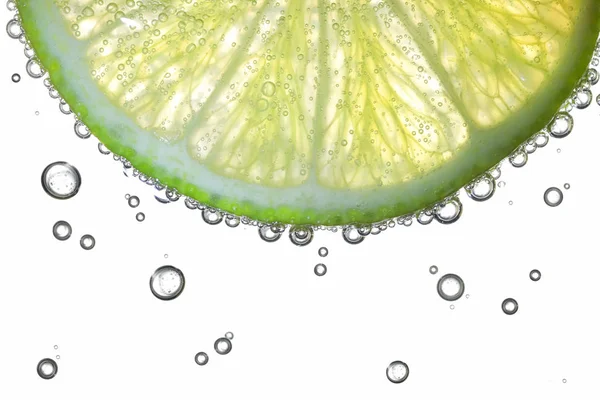 Lemon Slice In Water With Bubbles — Stock Photo, Image